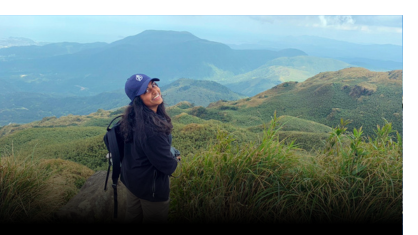 Fulbright student looking at mountains abroad