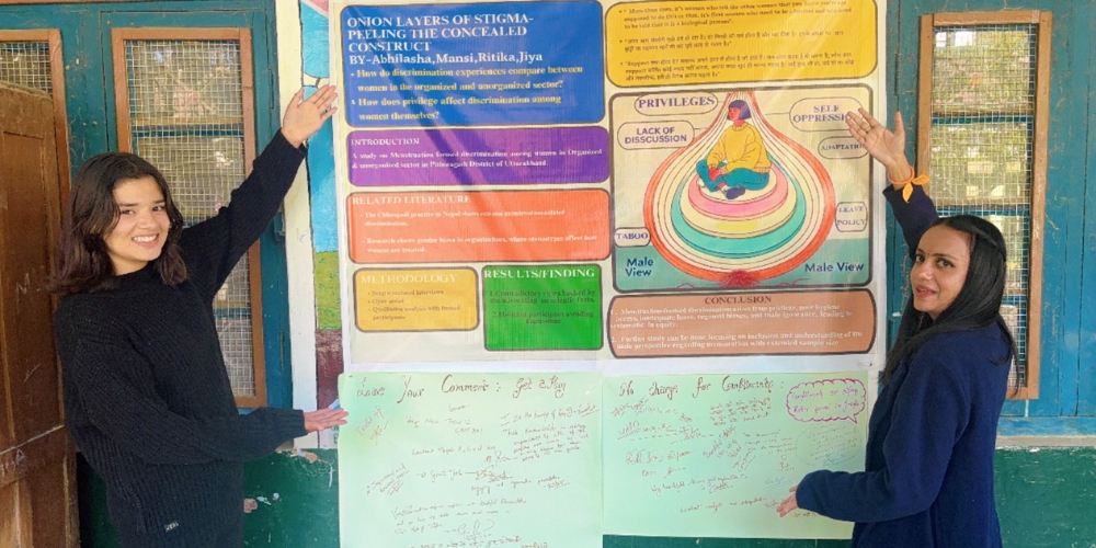 The winning research team among the undergraduates at the workshop, Abhilasha and Mansi, created a research poster on perceptions about menstruation in their local community. (Uttarakhand, India)