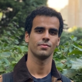 A headshot of Angad Singh