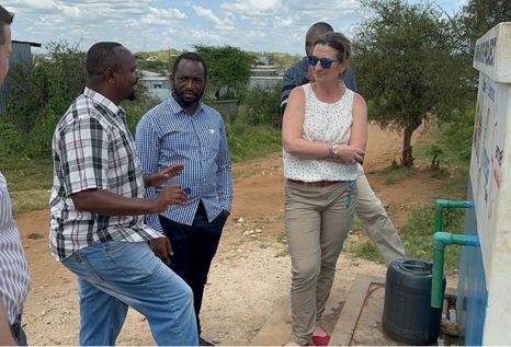 Sera Young, co-lead of the Making Water Insecurity Visible Global Working Group, visits with Kajiado county water officials in Kenya to learn about ongoing water issues.