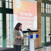 After Mayor Brandon Johnson and Chief Sustainability Officer Angela Tovar's opening remarks, they watched scenes from “Cooked: Survival by Zip Code”—a sobering reminder of the more than 739 neighbors who lost their lives during Chicago’s 1995 heat wave.