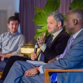 Speakers talking on stage