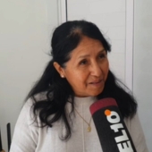 Guadalupe Colque speaks during a TV interview.