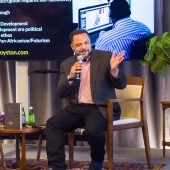 Royston talking on stage