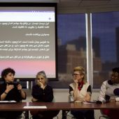 The first panel was hosted in Persian with a live English translation displayed using Interprefy, a live AI translator. The remaining panels were in English with a Persian translation.