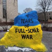 Student members of the Ukranian club at Northwestern gathered to paint the Rock, a popular landmark on campus, to commemorate 4 years of war. 