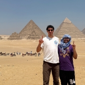 Taher and Zaim pictured with the pyramids of Giza