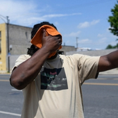 A man cools himself during a heat wave in Chicago