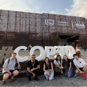 Students in front of COP30 sign