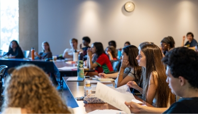 Students in the GESI program listening in a classroom