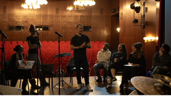 Ryan Nelson leads a rehearsal for Bosnian musicians