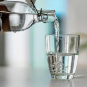 water pouring into glass.